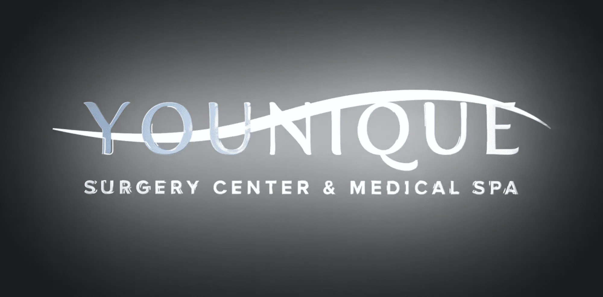 Younique Surgery Center and Medical Spa logo on a dark background.
