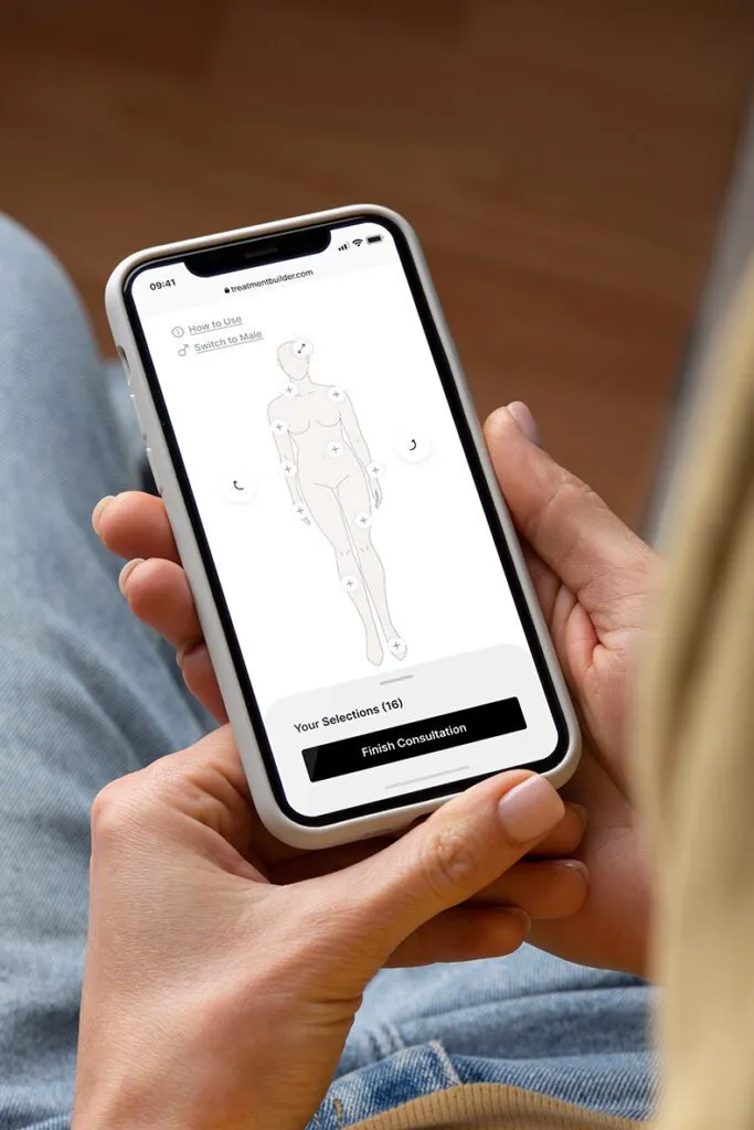 Person using a plastic surgery consultation app on a smartphone.