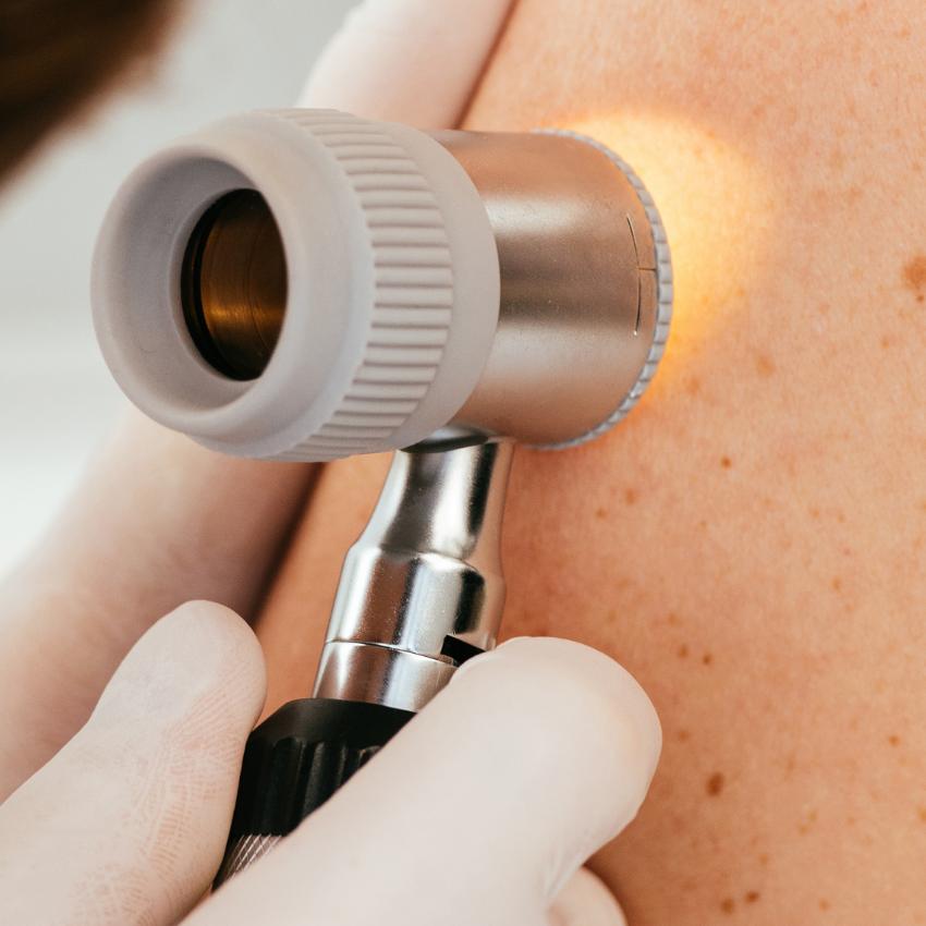 Doctor consulting with a patient in a plastic surgery clinic.