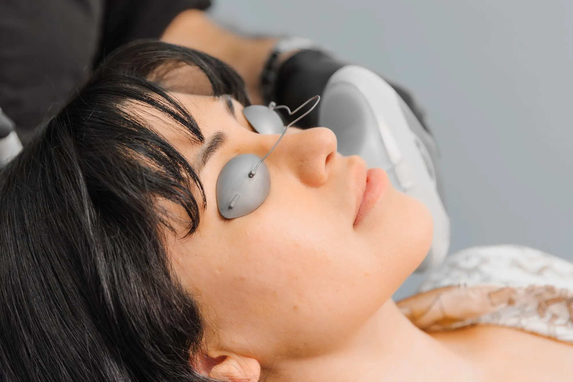 Patient receiving laser treatment at a plastic surgery center.