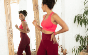 woman excited to look in mirror after weight loss with GLP-1s